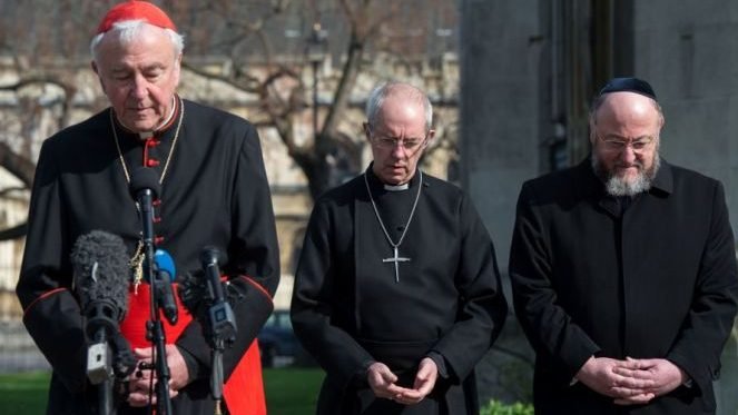 Cardinal Vincent Nichols, the Archbishop of Canterbury, Justin Welby, and Chief Rabbi Ephraim Mirvis attend a vigil in London, England, March 24, 2017. (AFP via Getty Images)