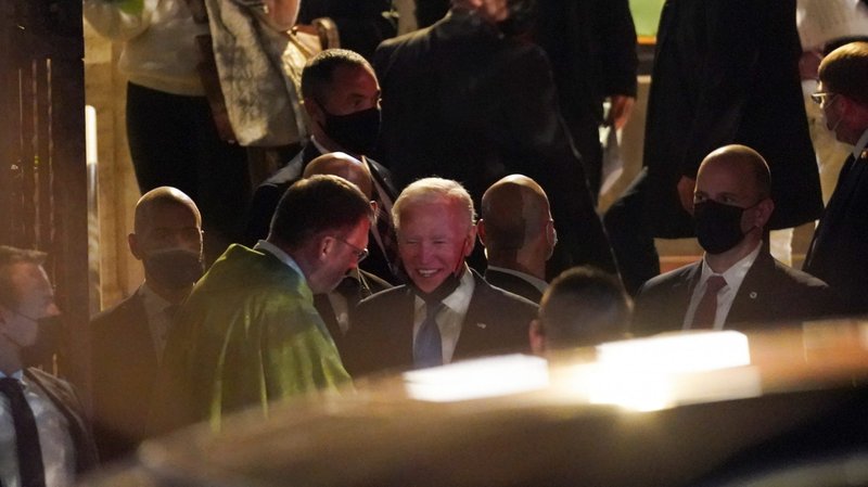 U.S. President Joe Biden speaks with Paulist Father Steven J. Petroff after attending a Saturday evening Mass at St. Patrick's Church during a break in the G-20 summit in Rome Oct. 30, 2021. (CNS photo/Kevin Lamarque, Reuters)