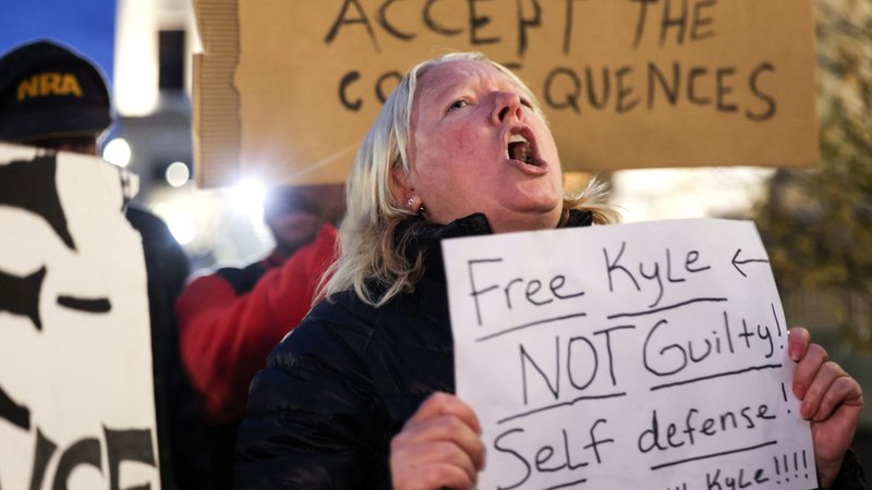 Protesters in Kenosha, Wis., demonstrate outside the Kenosha County Courthouse Nov. 15, 2021, during the trial of Kyle Rittenhouse. On Nov. 19, the jury acquitted him of the shooting deaths of two people and wounding of another with an AR-15-style rifle Aug. 25, 2020, during civil unrest in Kenosha over the shooting two days earlier of a Black man, Jacob Blake, by a white police officer. Lawyers for Rittenhouse argued their client acted in self-defense. (CNS photo/Evelyn Hockstein, Reuters)