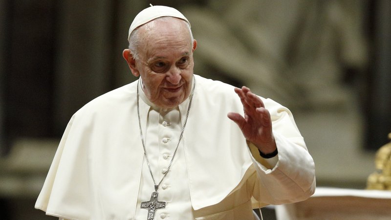 Pope Francis greets people as he leads the first part of his general audience in St. Peter's Basilica at the Vatican Nov. 24, 2021. (CNS photo/Paul Haring)