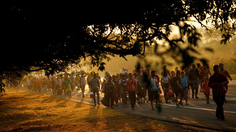Migrants seen walking in a caravan near Villa Mapastepec, Mexico, Nov. 22, 2021, head to the U.S. border. (CNS photo/Jose Luis Gonzalez, Reuters)