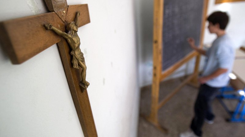 A crucifix is pictured on the wall of a classroom. (CNS photo/Tony Gentile, Reuters)
