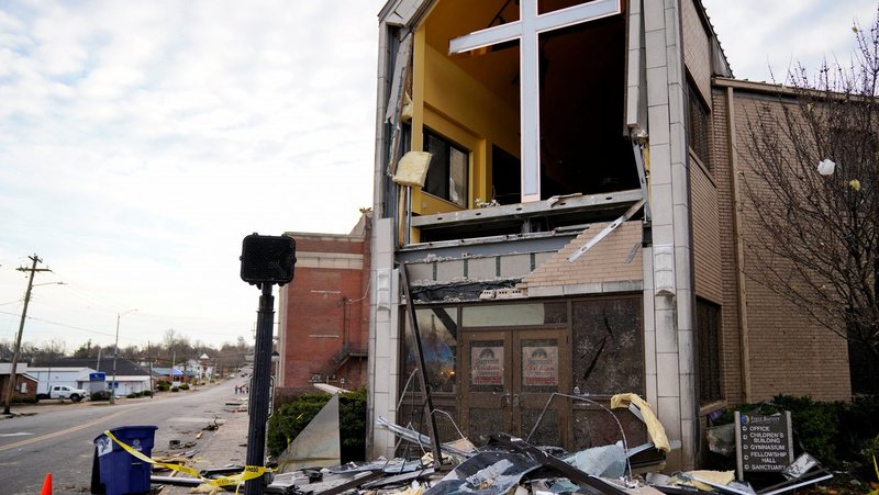 Debris surrounds a badly damaged church in Mayfield, Ky., Dec. 11, 2021, after a devastating tornado ripped through the town. More than 30 tornadoes were reported across six states late Dec. 10, and early Dec. 11, killing dozens of people and leaving a trail of devastation. (CNS photo/Cheney Orr, Reuters)