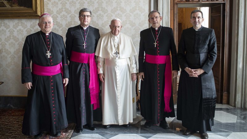 Pope Francis is pictured with the officers of the French bishops' conference during a meeting at the Vatican Dec. 13, 2021. The bishops said the pope encouraged them to continue responding together to a recent independent report on sexual abuse in the church in France. Pictured from left are: Bishop Olivier Leborgne of Arras, vice president of the conference; Archbishop Éric de Moulins-Beaufort of Reims, president; Bishop Dominique Blanchet of Créteil, vice president; and Father Hugues de Woillemont, secretary general. (CNS photo/Vatican Media)
