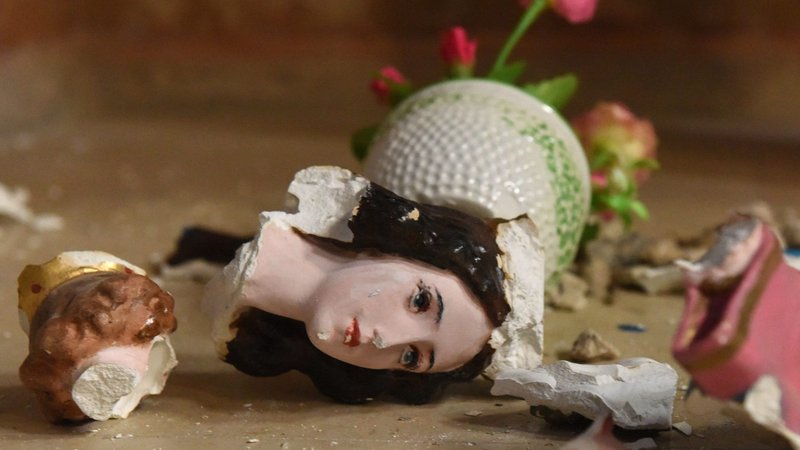 A shattered statue of Mary and the Christ Child is pictured inside St. Stephen Church in the Beit Jamal Salesian monastery near Jerusalem Sept. 26, 2017, after vandals broke into the church. "Since 2012, there have been countless incidents of physical and verbal assaults against priests and other clergy, attacks on Christian churches, with holy sites regularly vandalized and desecrated," Christian leaders said Dec. 13, 2021. (CNS photo/Debbie Hill)