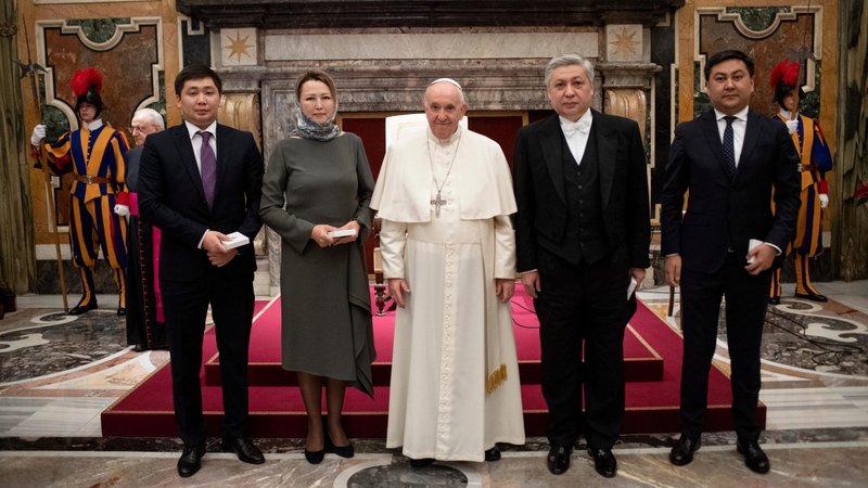 Pope Francis is pictured with new ambassadors to the Holy See during an audience with ambassadors from Moldova, Kyrgyzstan, Namibia, Lesotho, Luxembourg, Chad and Guinea-Bissau, at the Vatican Dec. 17, 2021. In a speech to the ambassadors, the pope said the pandemic serves as a reminder that the world cannot move forward without cooperation and solidarity. (CNS photo/Vatican Media)
