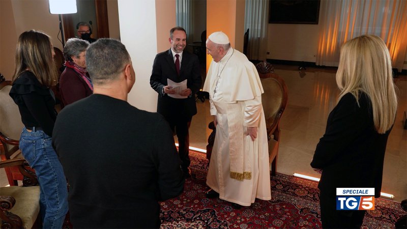 Pope Francis is interviewed at his Vatican residence by adults facing challenging experiences in their lives for a program broadcast on Italian television Channel 5, Mediaset, Dec. 19, 2021. Journalist Fabio Marchese Ragona, center, hosted the program. (CNS photo/courtesy Mediaset)