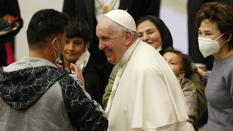 Pope Francis greets people during his general audience in the Paul VI hall at the Vatican Dec. 22, 2021. (CNS photo/Paul Haring)