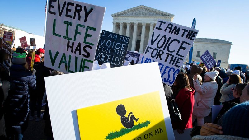 Pro-life advocates are seen near the U.S. Supreme Court Dec. 1, 2021, the day justices heard oral arguments in a case about a Mississippi law that bans abortions after 15 weeks of gestation. (Tyler Orsburn/CNS)