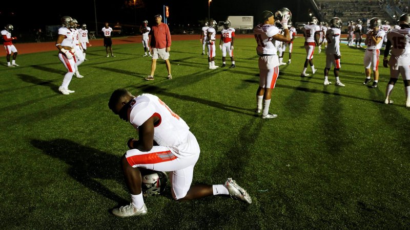 High school football players are seen in this illustration photo. (CNS photo/Jonathan Ernst, Reuters)