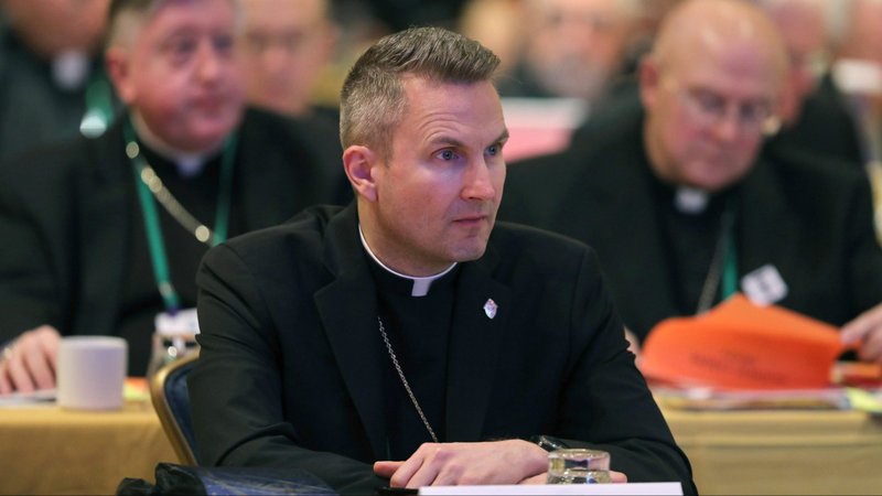Chicago Auxiliary Bishop Ronald A. Hicks listens to a speaker Nov. 13, 2018, at the fall general assembly of the U.S. Conference of Catholic Bishops in Baltimore. As El Salvador gets ready for four beatifications Jan. 22, 2022, Bishop Hicks, who spent time as a missionary in the Central American country, says there's a lot to glean from lives of the four martyrs from the tiny nation. (CNS photo/Bob Roller)