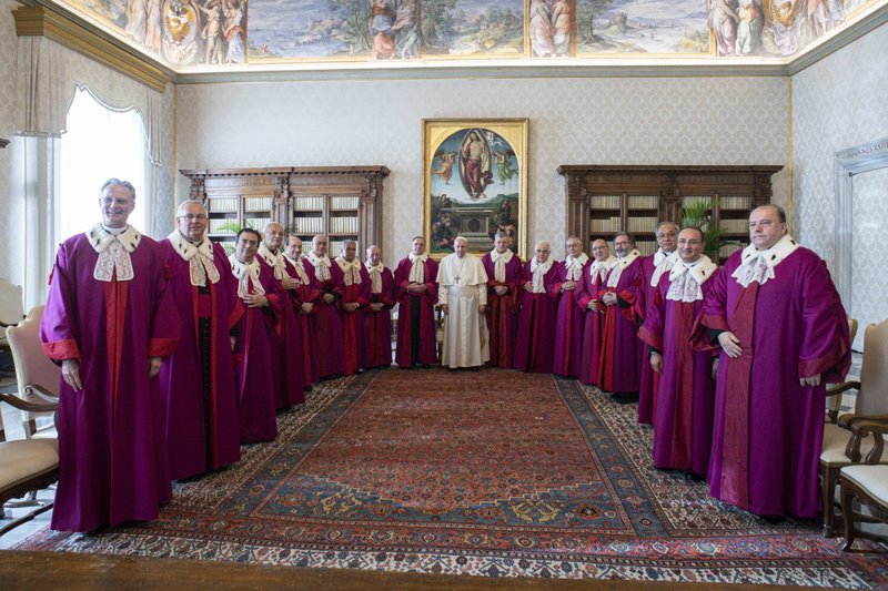 Pope Francis is pictured with members of the Tribunal of the Roman Rota during an audience at the Vatican Jan. 27, 2022. The Vatican court deals mainly with appeals in marriage annulment cases. (CNS photo/Vatican Media)