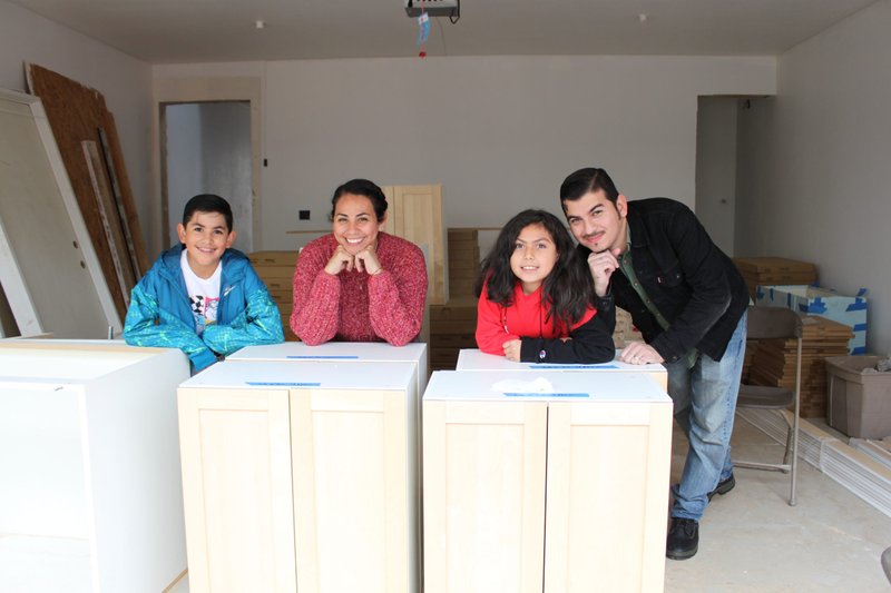 The first recipient family of this Long Beach Washington neighborhood project are Long Beach natives, from left, son Valdemar Chavez III, mother Cynthia Evangelista, daughter Logan Chavez, and father Valdemar Chavez Jr. (Barry Smith/Habitat for Humanity Catholic Coalition)