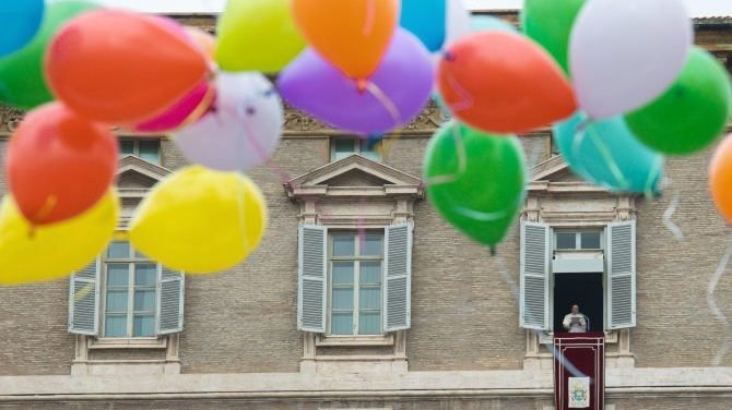 Children participating in a Catholic Action initiative helped to release colorful balloons at the end of the Angelus on Jan. 30, 2022. (Vatican Media via CNA)