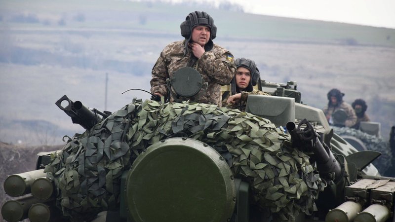 Service members of the Ukrainian Armed Forces ride atop an anti-aircraft gun-missile complex known as “Tunguska” during drills at an area of the Joint Forces Operation in an unknown location in eastern Ukraine, in this handout picture released April 20, 2021. (CNS photo/Press service of Joint Forces Operation via Reuters)