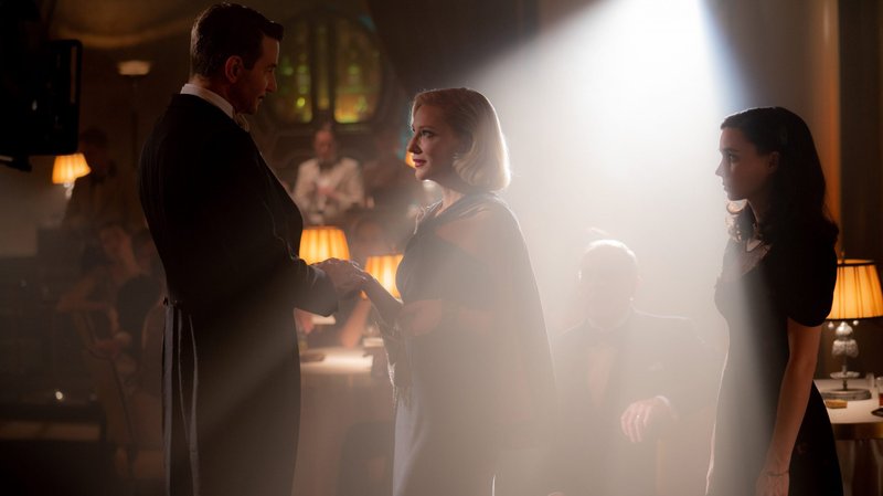 Bradley Cooper, Cate Blanchett and Rooney Mara star in a scene from the movie "Nightmare Alley." The Catholic News Service classification is L -- limited adult audience, films whose problematic content many adults would find troubling. The Motion Picture Association rating is R -- restricted. Under 17 requires accompanying parent or adult guardian. (CNS photo/Kerry Hayes, 20th Century Studios)