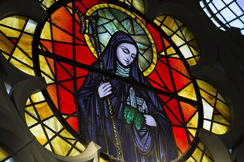 St. Brigid of Kildare is pictured in a stained-glass window in St. Brigid's Church in Crosshaven, a village in County Cork, Ireland, Jan. 20, 2022. The Irish government has added a new public holiday to the national calendar to honor the country's female patron, St. Brigid of Kildare. (CNS photo/Cillian Kelly)