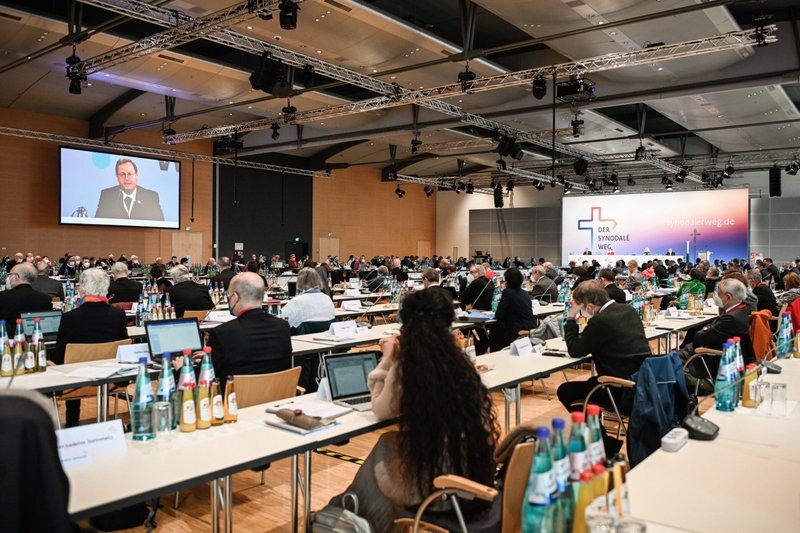 Bishop Georg Bätzing, president of the German bishops' conference, is projected on a screen as participants attend the third Synodal Assembly in Frankfurt Feb. 3, 2021. (CNS photo/Julia Steinbrecht, KNA)