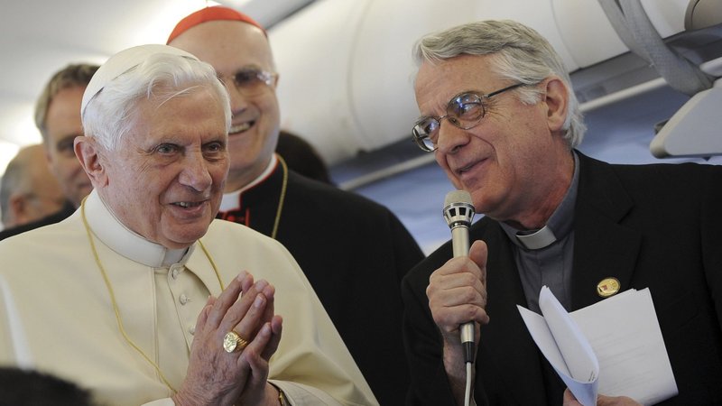Pope Benedict XVI listens to Jesuit Father Federico Lombardi, the Vatican spokesman, on a flight to Portugal in this May 11, 2010, file photo. Father Lombardi said Pope Benedict has never attempted to hide what is true, no matter how painful recognizing reality would be. (CNS photo/Stefano Rellandini, Reuters)