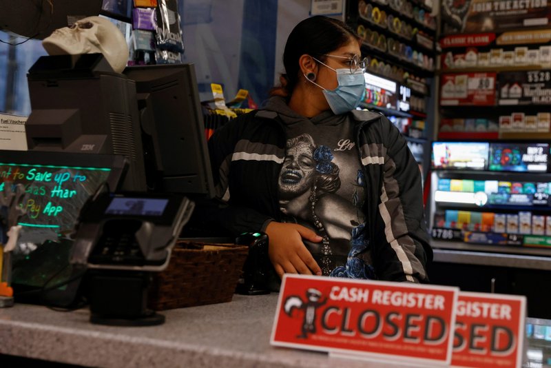 Ariana Mora of Jerome, Idaho, works while 8 months pregnant Oct. 27, 2021. The Senate Health, Education, Labor and Pensions Committee advanced the Pregnant Workers Fairness Act in August by a 19-2 vote that same year. The House of Representatives approved the bill 315-101 three months earlier. (CNS photo/Shannon Stapleton, Reuters)
