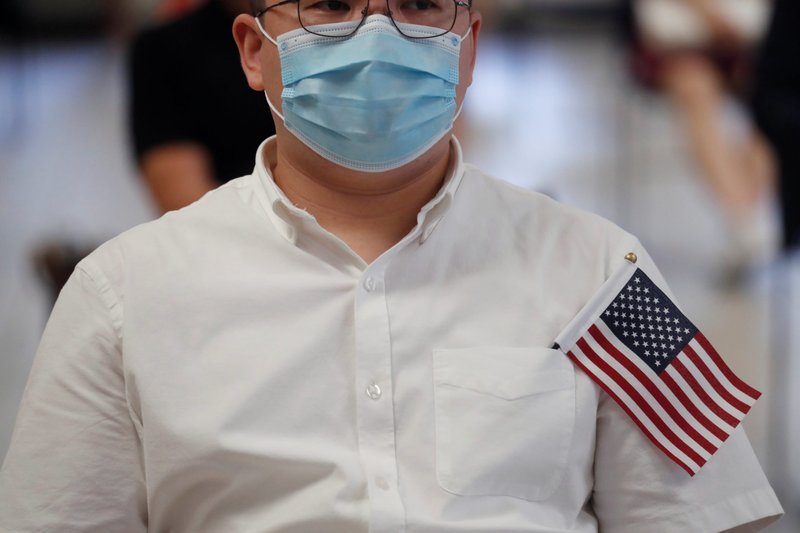 A candidate for citizenship in New York City is seen during a U.S. Citizenship and Immigration Services naturalization ceremony July 22, 2020. (CNS photo/Shannon Stapleton, Reuters)