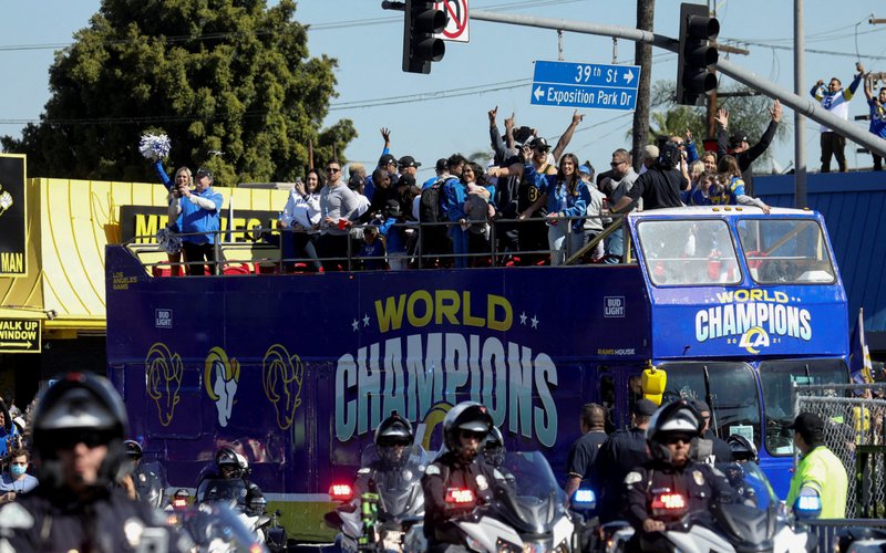 The Los Angeles Rams celebrate their Feb. 13, 2022, win over the Cincinnati Bengals at the Super Bowl parade at Memorial Coliseum in Los Angeles Feb. 16. (CNS photo/David Swanson, Reuters)