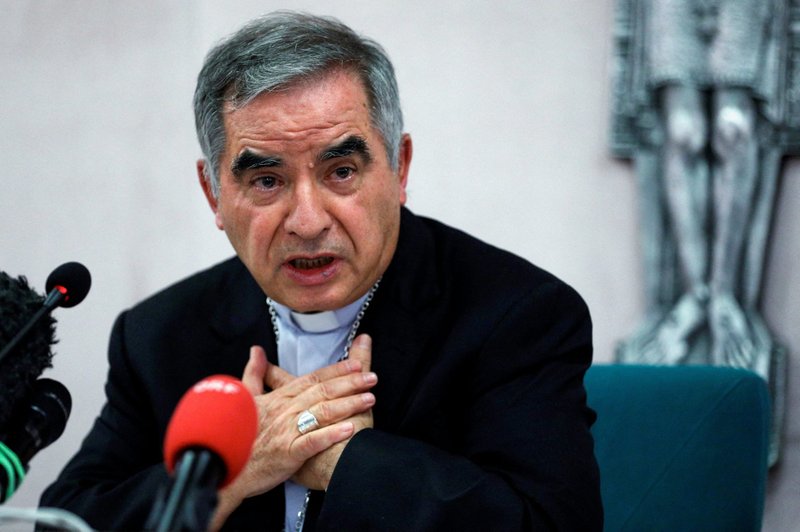Cardinal Angelo Becciu speaks with journalists during a news conference in Rome in this Sept. 25, 2020, file photo. At the Feb. 18, 2022, session of the Vatican trial involving financial malfeasance and corruption, Cardinal Becciu told journalists a recent probe by prosecutors in the Sardinian city of Sassari was a "blitz" attack due to a report given by Vatican prosecutors. (CNS photo/Guglielmo Mangiapane, Reuters)