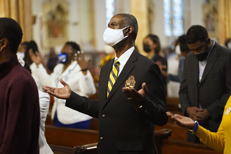 A man prays during a Mass marking Black Catholic History Month Nov. 21, 2021, at Our Lady of Victory Church in the Bedford-Stuyvesant section of Brooklyn, N.Y. The liturgy was co-sponsored by the Diocese of Brooklyn and the Archdiocese of New York. (CNS photo/Gregory A. Shemitz)