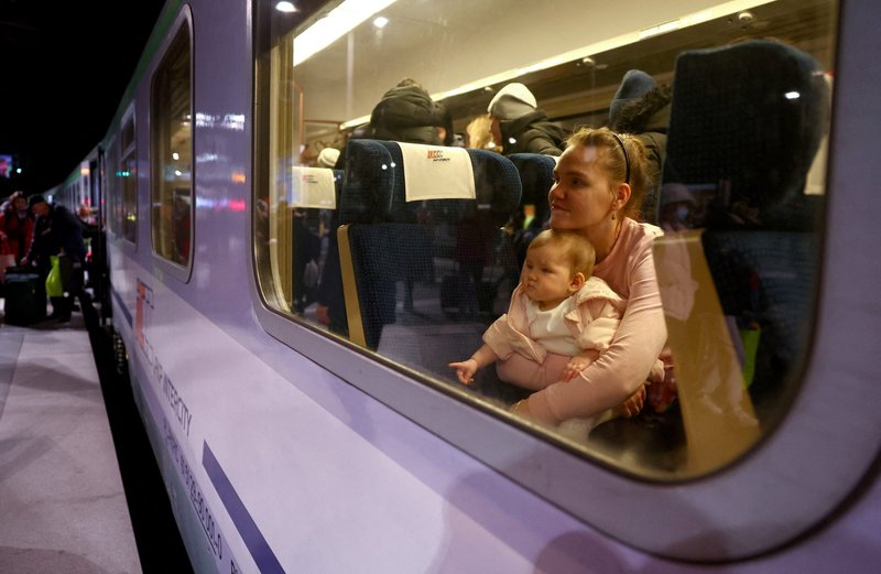 A mother and daughter from Kyiv, Ukraine, arrive at Berlin's central station March 7, 2022, following Russia's war on Ukraine. East European Catholic leaders are fighting an increased risk of trafficking of Ukrainian refugees. (CNS photo/Lisi Niesner, Reuters)