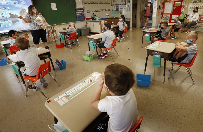 Students attend class at Queen of the Rosary School in Elk Grove Village, Ill., in this Aug. 17, 2020, file photo. The Congregation for Catholic Education issued a document on the importance of promoting and safeguarding the Catholic identity of Catholic schools, which includes fostering dialogue. (CNS photo/Karen Callaway, Chicago Catholic)
