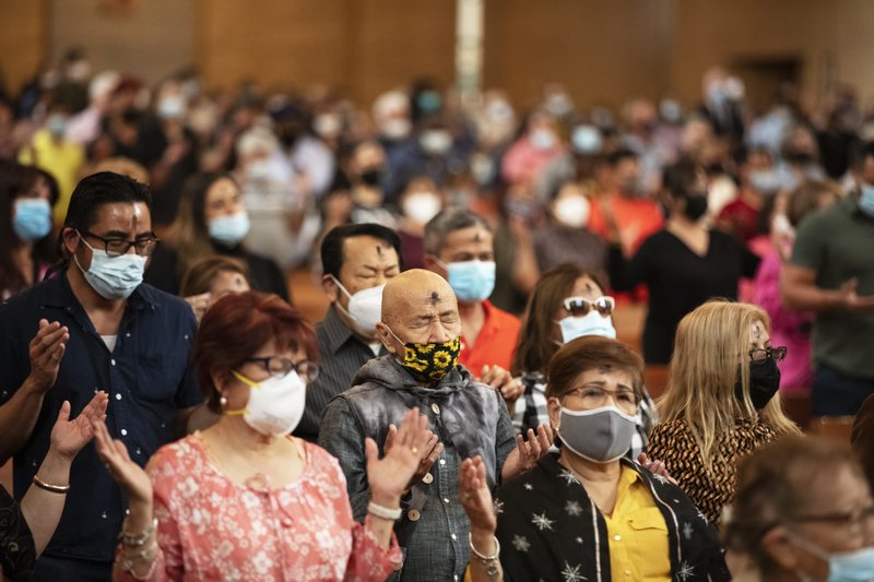 LA Catholics pray during Ash Wednesday Mass March 2 at the Cathedral of Our Lady of the Angels. (Victor Alemán)