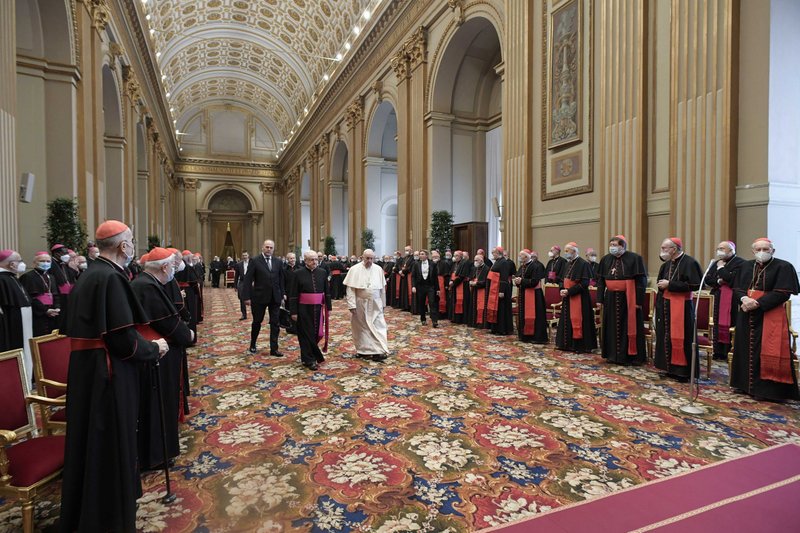 Pope Francis arrives for an audience to exchange Christmas greetings with members of the Roman Curia in the Apostolic Palace at the Vatican Dec. 23, 2021. (CNS/Vatican Media)