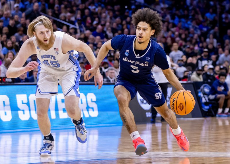 Daryl Banks III of Saint Peter's University dribbles the ball March 27, 2022, during the Peacocks' NCCA March Madness game against the University of North Carolina in Philadelphia. The Tar Heels won the East regional final 69-49. (CNS photo/Rich Schultz, Stockton Photography, courtesy Saint Peter's University)
