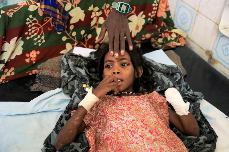 An 8-year-old girl receives treatment at Ethiopia's Dubti Referral Hospital Feb. 24, 2022. The girl lost her left hand from explosives left near her house in the aftermath of fighting between the Ethiopian National Defense Force and the Tigray People's Liberation Front. (CNS photo/Tiksa Negeri, Reuters)