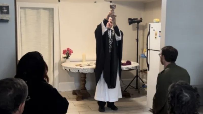 Father Bill Kuchinsky raises a chalice during the consecration at a funeral Mass for 115 aborted babies on April 1, 2022, in Washington, D.C. (Courtesy of Father Bill Kuchinsky via CNA)