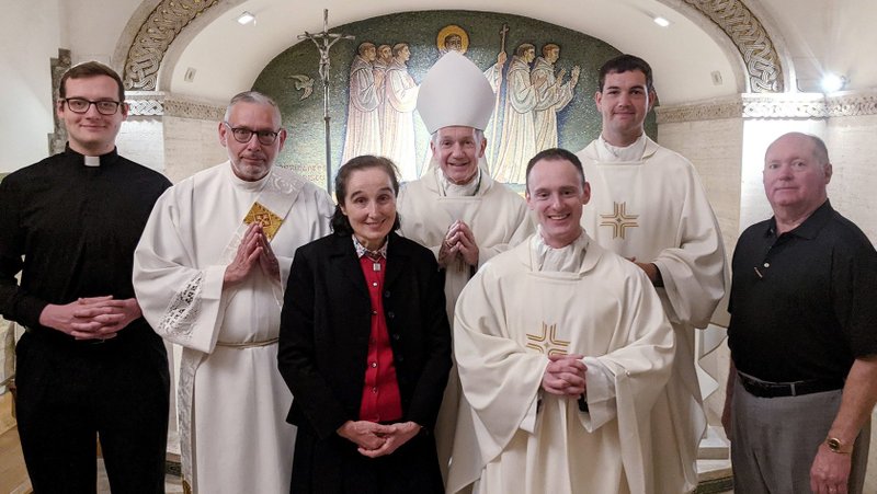 Bishop Thomas J. Paprocki of Springfield, Ill., is pictured with Dr. Gianna Emanuela Molla, the daughter of Italian St. Gianna Beretta Molla, April 29, 2022. Also pictured are Troy Niemerg, seminarian; Deacon Rob Sgambelluri; Father Dominic Rankin; Father Christopher Trummer; and P.J. Staab, a parishioner from the Cathedral of the Immaculate Conception. (CNS photo/courtesy Diocese of Springfield)