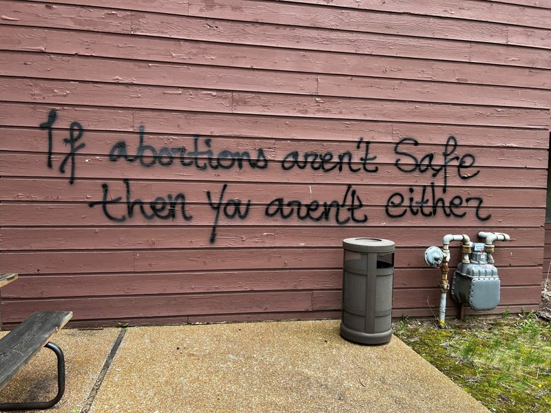 A threat is spray painted on the building wall near Wisconsin Family Action's offices in Madison, Wis., May 8, 2022. (CNS photo/Molly Beck, USA TODAY NETWORK via Reuters)