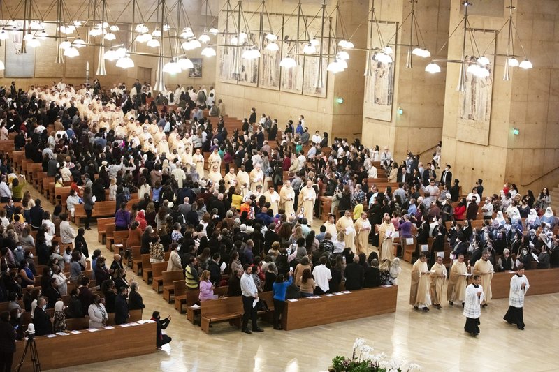 LA priests process in during the 2022 Chrism Mass at the Cathedral of Our Lady of the Angels. (Victor Alemán)