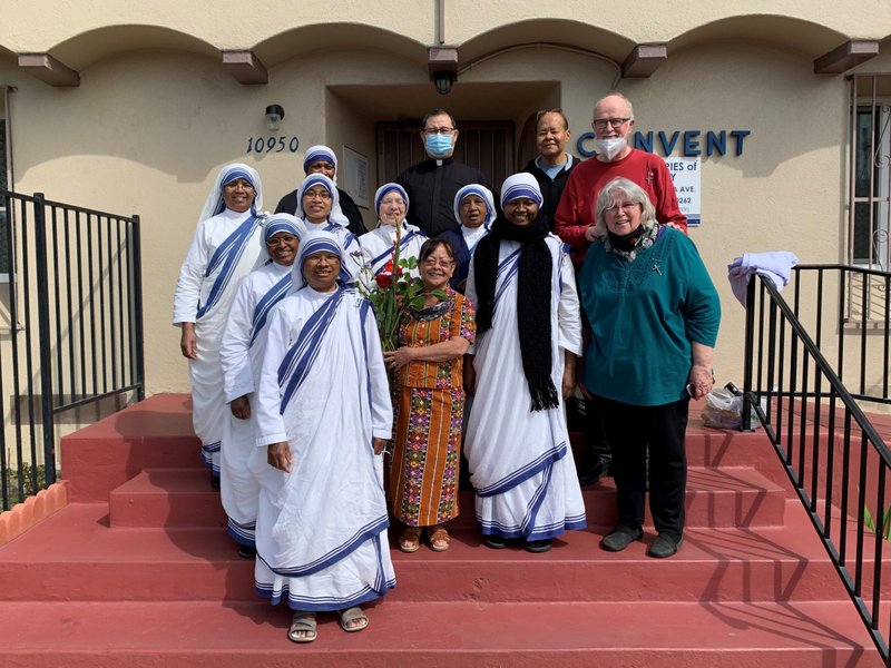 Nieva Alix (center) with members of the Missionaries of Charity in Lynwood after making her lifetime vows as a Lay Missionary of Charity on March 19. (Submitted photo)