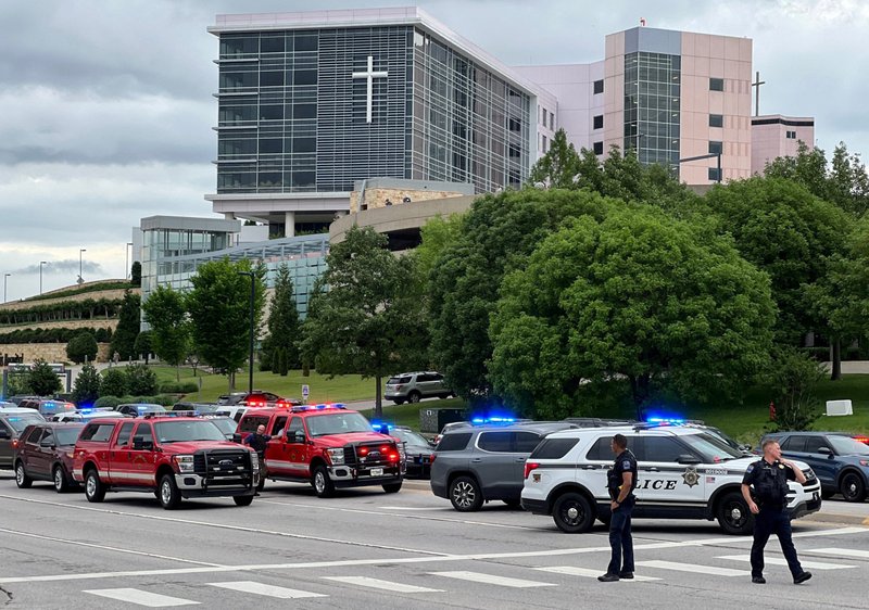 Emergency personnel in Tulsa, Okla., work at the scene of a shooting on the St. Francis Hospital campus June 1, 2022. Four people were killed on the second floor of the medical building. The gunman was later found dead. (CNS photo//Michael Noble Jr., Reuters)