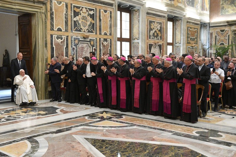 Pope Francis waves as he arrives for an audience with bishops and priests from Sicily June 9, 2022, in the Apostolic Palace at the Vatican. The pope told them that Catholics expect their priests to be spiritual and moral guides, advocates for a better world and a reference point for young people. (CNS photo/Vatican Media)