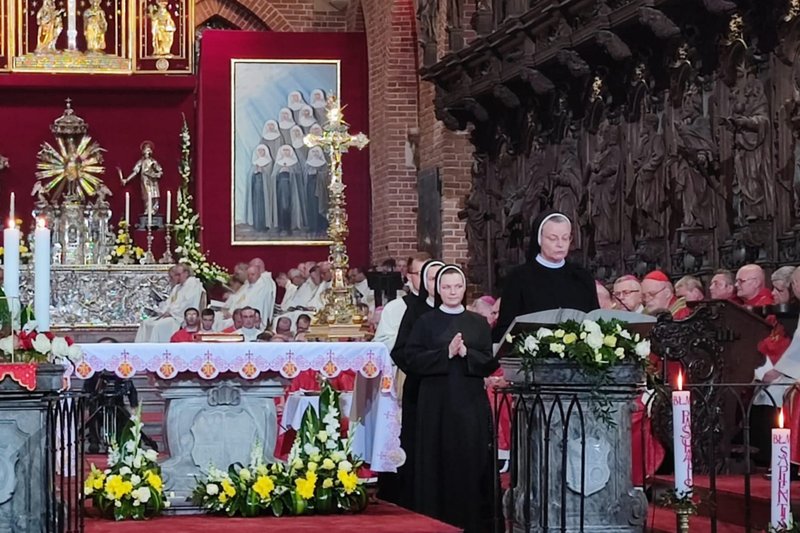 Sisters of St. Elizabeth read at a Mass in Wroclaw, Poland, June 11, 2022; the Mass featured the beatification of 10 Polish members of the order who were killed by Russian soldiers at the end of World War II. (CNS photo/courtesy Congregation of Sisters of St. Elizabeth)
