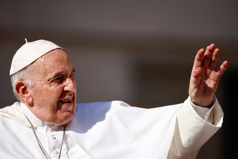 Pope Francis greets people as he arrives for his general audience in St. Peter's Square at the Vatican June 15, 2022. (CNS photo/Yara Nardi, Reuters)