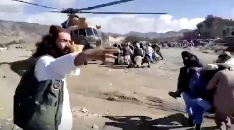Rescuers carry injured people to a helicopter following an earthquake in a mountainous, remote region of Afghanistan, June 22, 2022, in this screen grab taken from a video. (CNS photo/BAKHTAR NEWS AGENCY, handout via Reuters)