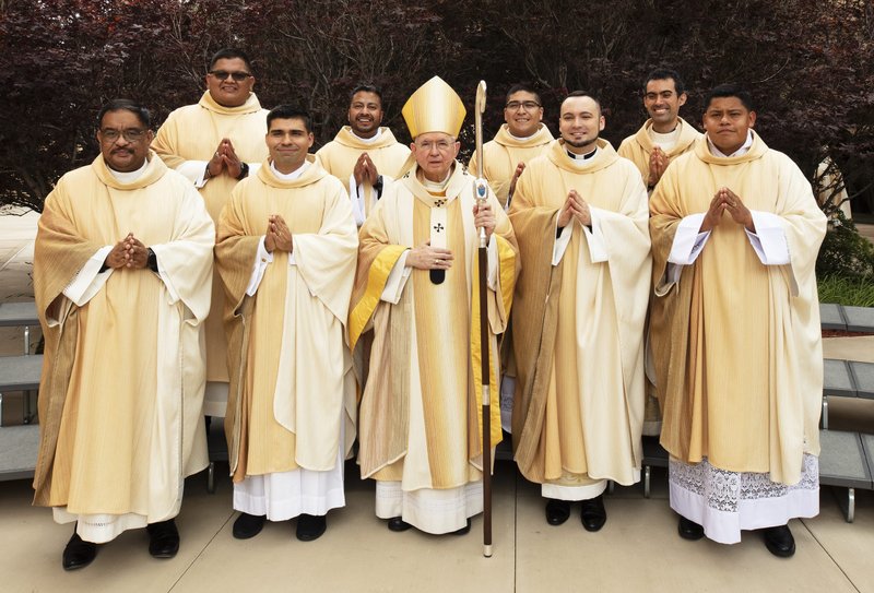 Archbishop José H. Gomez with this year’s ordinandi, from left: Justin Ordoveza, Guillermo “Memo” Alonso, Juan Martinez, Juan Gutierrez, Daniel Lopez, Kamil Ziolkowski, Daniel Vega, and Ramon Reyes. (Victor Alemán)