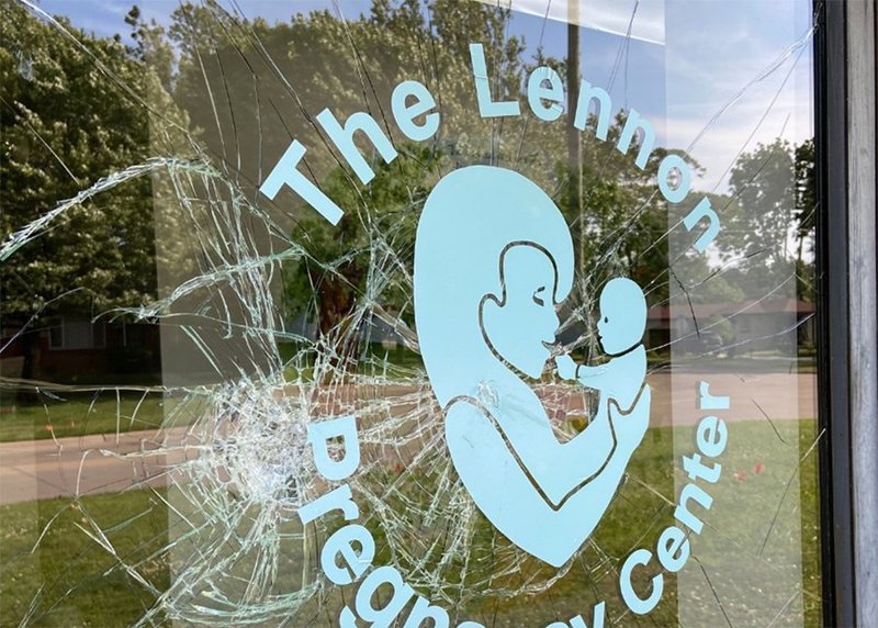 Vandals smashed nearly a dozen windows and spray-painted messages on the side of the building housing the Lennon Pregnancy Center in Dearborn Heights, Michigan, on June 20. (CNS screen grab/Facebook, Lennon Pregnancy Center)