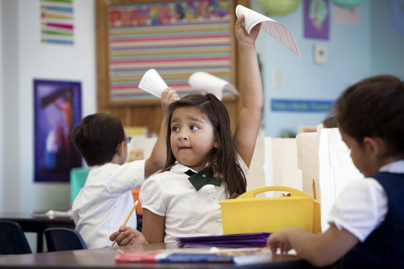 First-grade students finish an assignment at St. Ambrose Catholic School in Tucson, Ariz., in this 2014 photo. (CNS file photo/Nancy Wiechec)