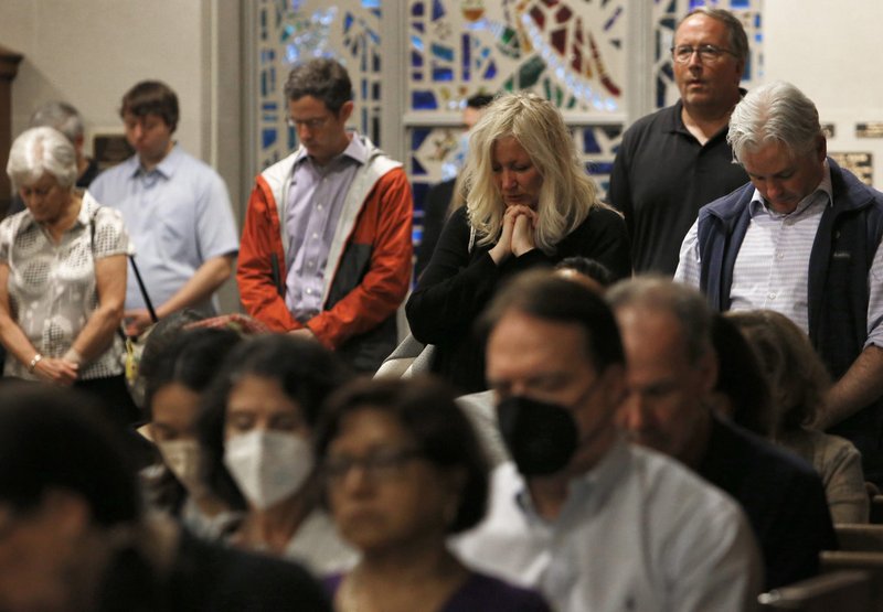 People pray and grieve during Mass at Immaculate Conception Church in Highland Park, Ill., July 5, 2020, one day after a mass shooter killed seven people and injured at least 30 people during the community's Independence Day parade. (CNS photo/Karen Callaway, Chicago Catholic)