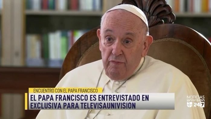 Pope Francis speaks in an interview with the Spanish-language TV network, Univision, in this still frame from video at the Vatican July 11, 2022. The pope spoke about U.S. President Joe Biden's support of abortion, about gun violence in the United States and about his tentative post-retirement plans -- if the time comes. (CNS photo/courtesy Televisa Univision)