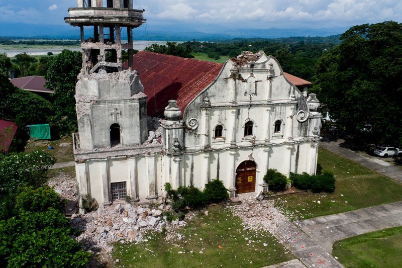 An aerial view shows a badly damaged church in Tayum, Philippines, July 28, 2022, in the aftermath of a magnitude 7 earthquake. The Archdiocese of Tuguegarao in northeastern Luzon said its churches were not only places of worship but symbolized the history and tradition of their people. (CNS photo/Lisa Marie David, Reuters)